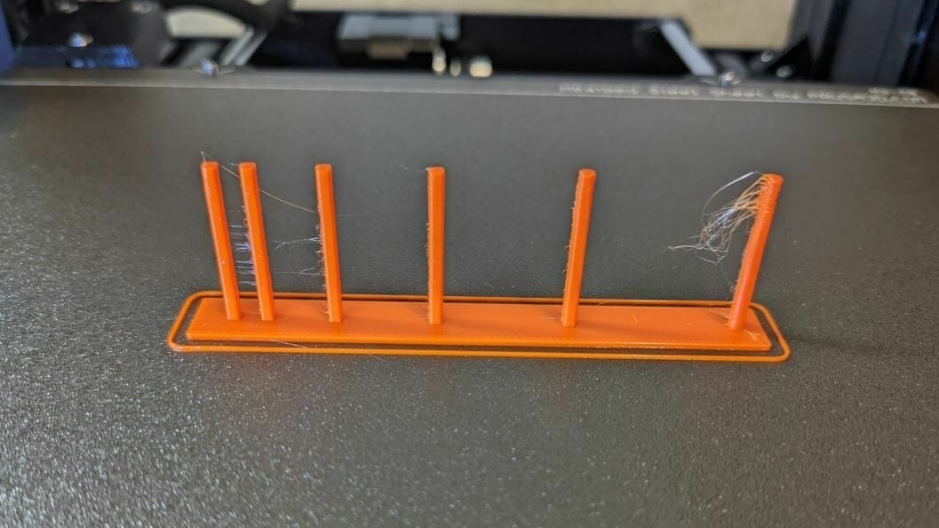 Using a smaller Minimum Extrusion Distance Window allows for more retractions between smaller distances