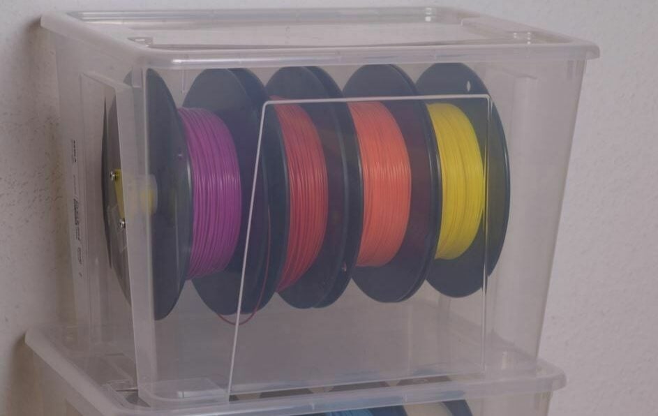 You can modify an IKEA Samla container to store up to 5 spools of filament