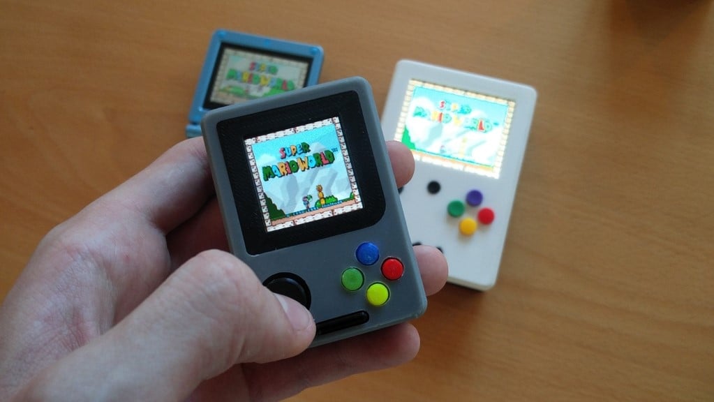 The GameBoy Nano is roughly the size of a deck of playing cards