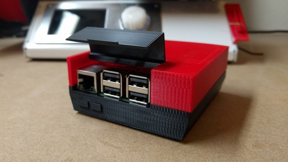 The BabyNES has a hatch to access all the Pi's ports