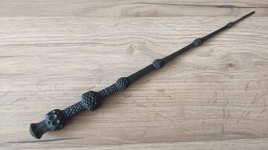 A simple model of the most powerful wand in history