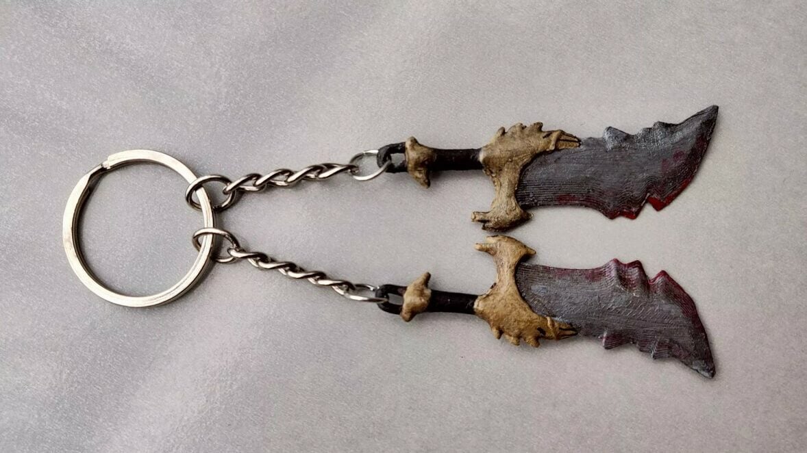 The glorious twin Blades of Chaos, connected to a keyring