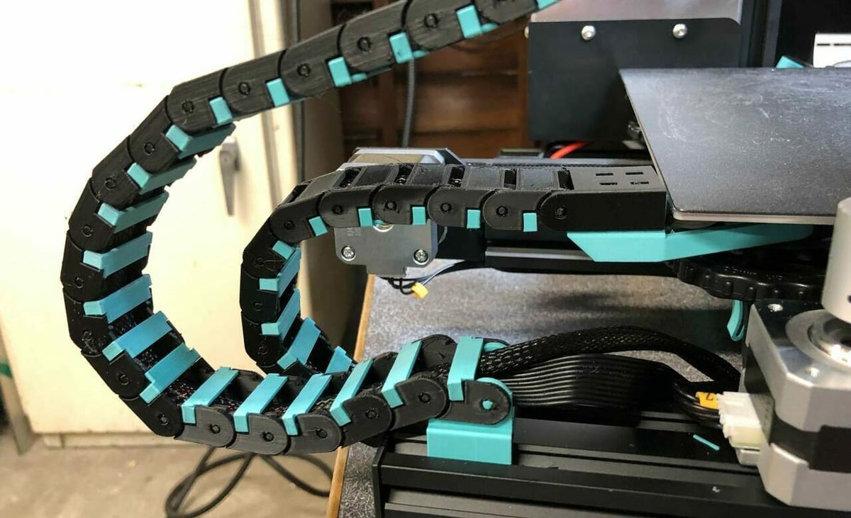 An Ender 3 Pro with an added cable chain, among other upgrades