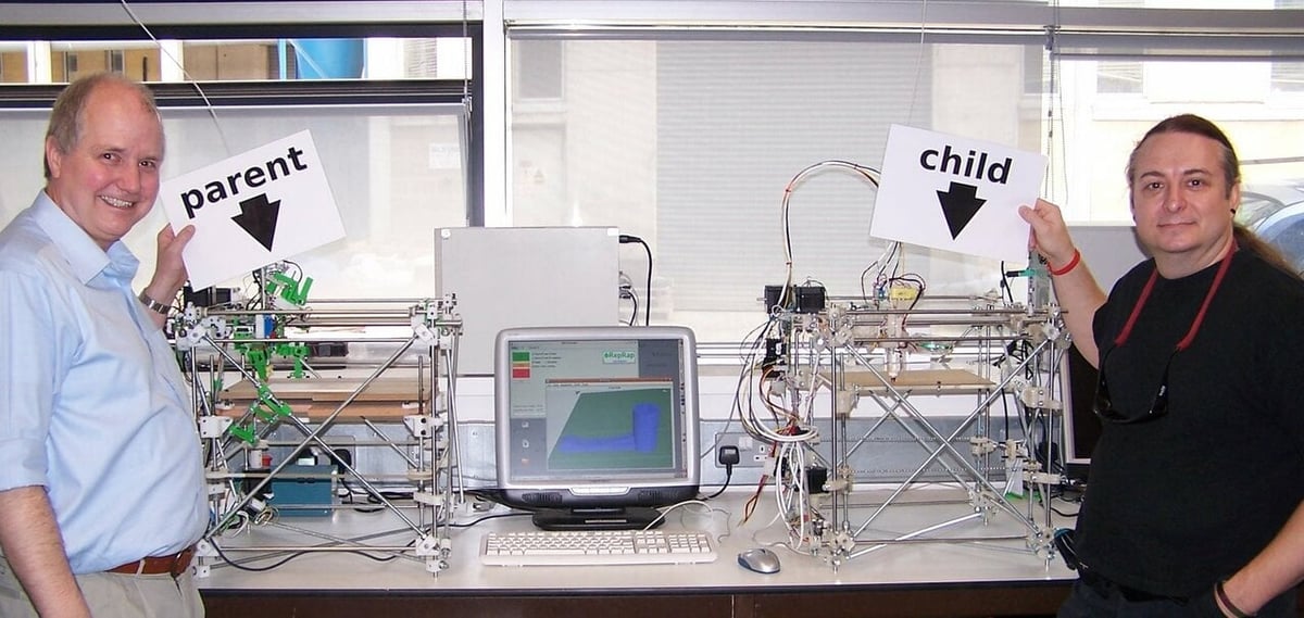 RepRap pioneers Adrian Bowyer and Vic Oliver show the first 3D printer replication