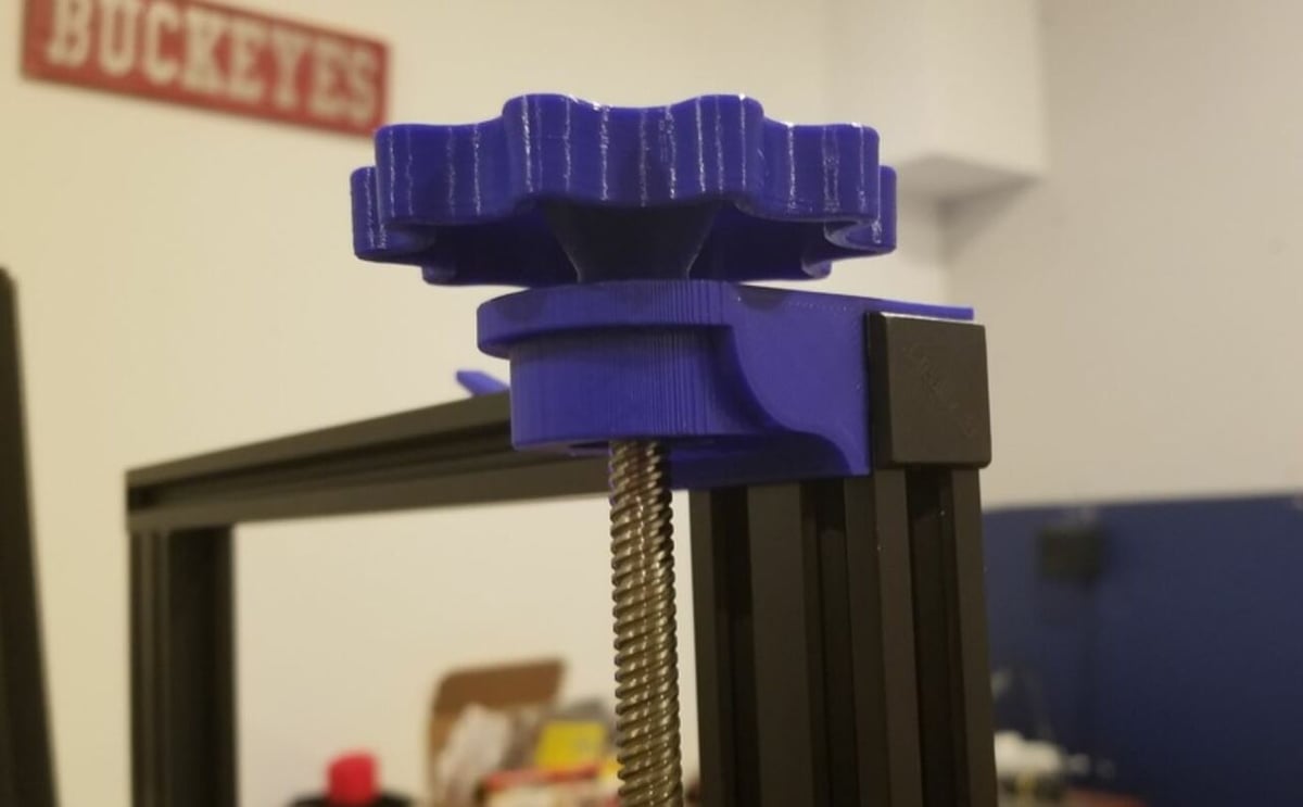 You can print a knob to be able to manually move the Z-axis lead screw