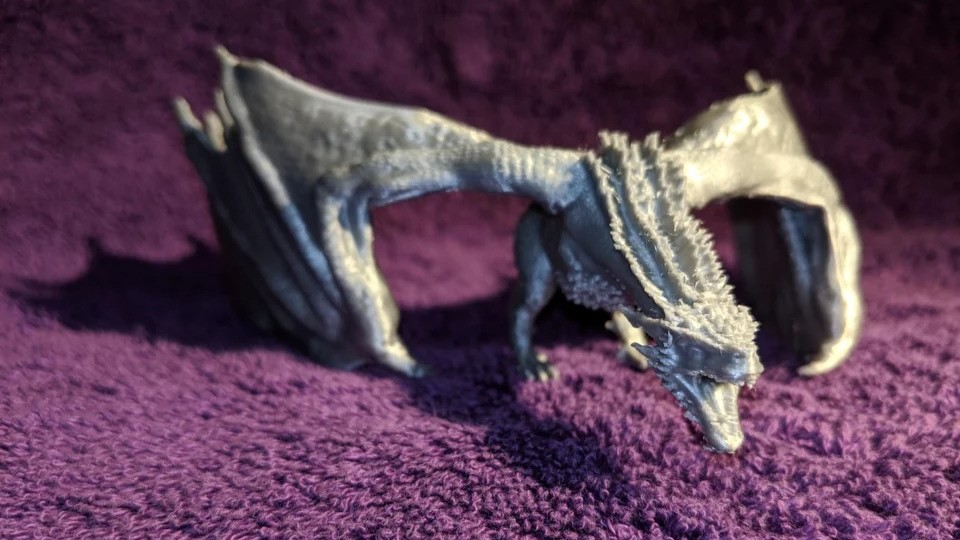 This ferocious dragon was printed with Eryone's Silk Silver PLA