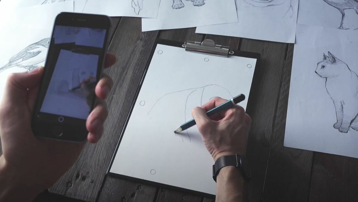 You can digitize a paper sketch using a scanning device or application