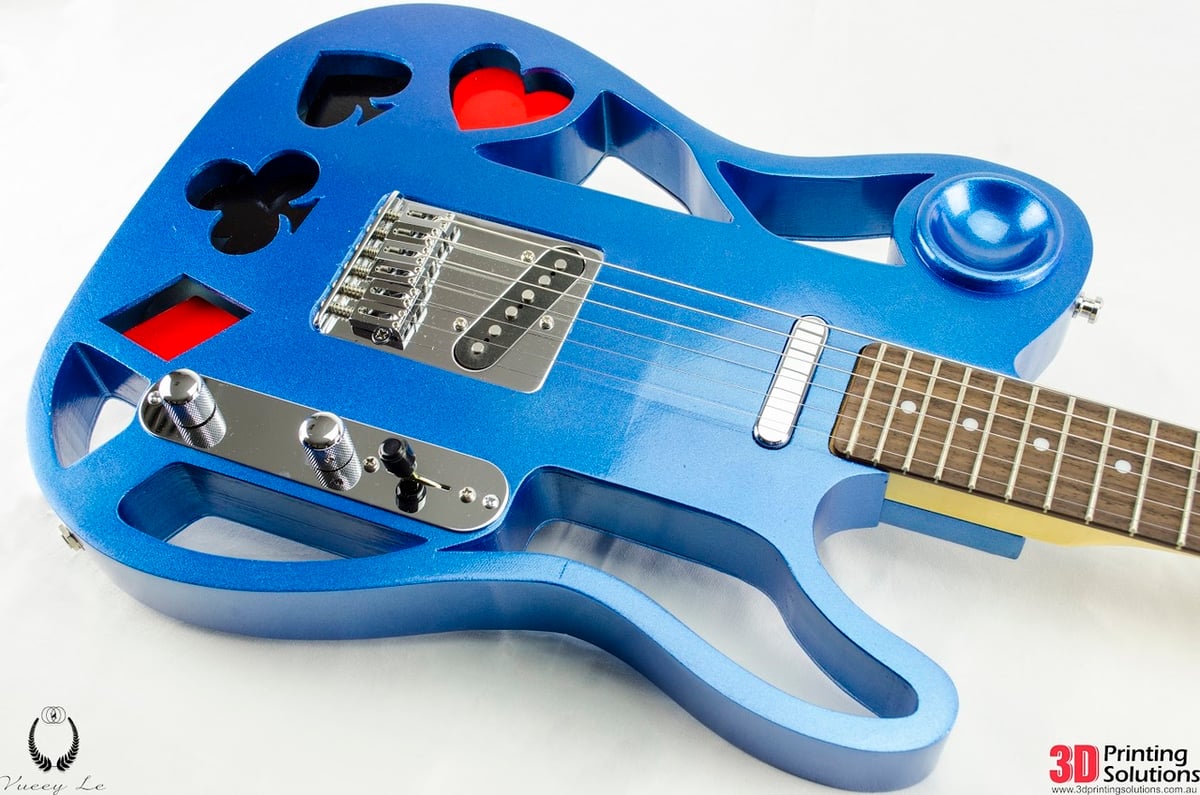The playing card motifs make this guitar as cool as it sounds