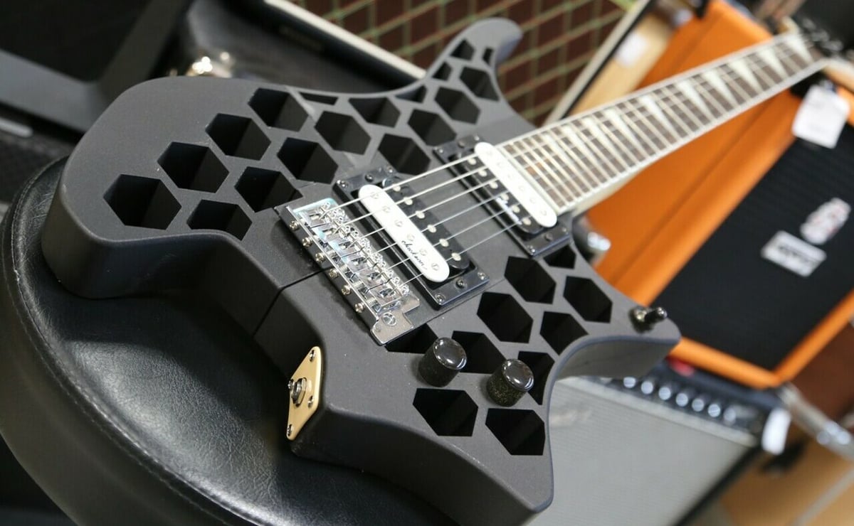 This guitar is not only aesthetically pleasing, but it's also optimized for sitting
