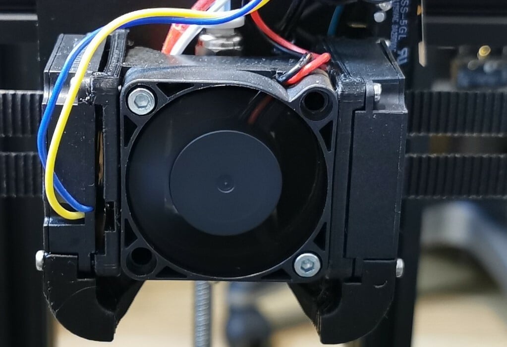 This fan duct upgrade adds two blower fans to the printhead