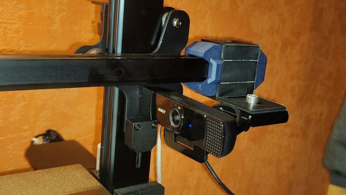You can mount your webcam on the moving X-axis gantry of your Vyper