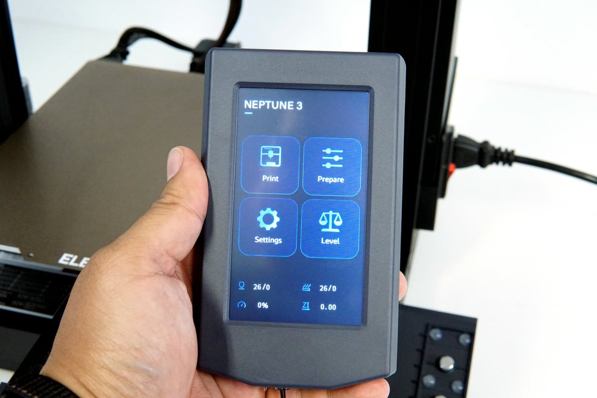 Elegoo Neptune 3 4.3-inch touchscreen held in a hand