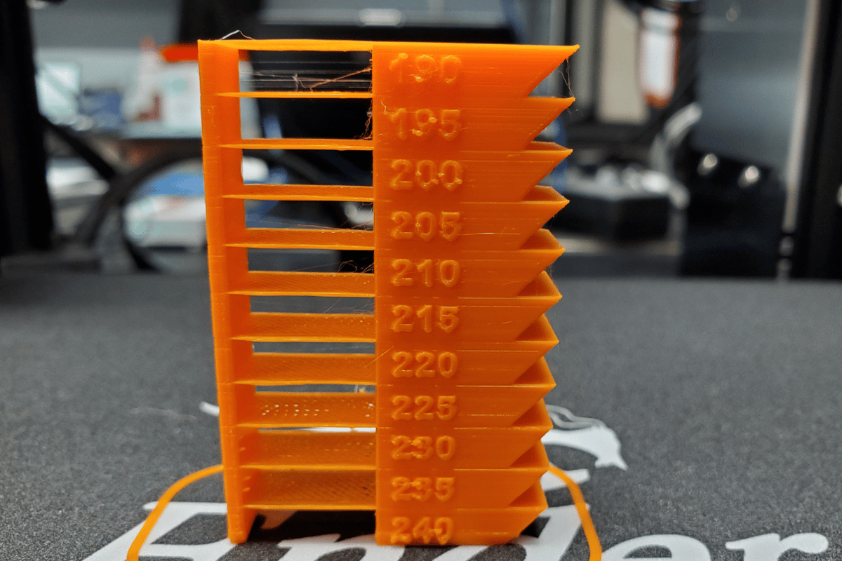 This temperature tower is printed in bright orange PLA