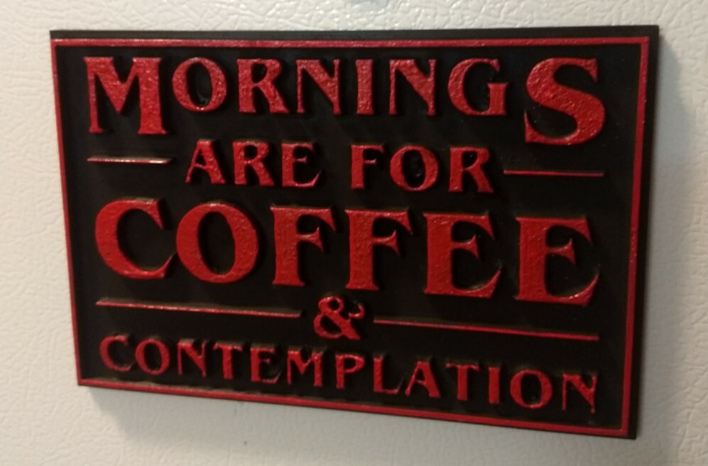 This sign serves as a reminder to contemplate with your morning coffee