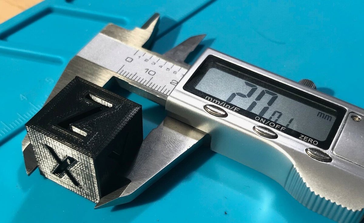 A calibrated 3D printer will print a calibration cube at its (almost) exact digital size