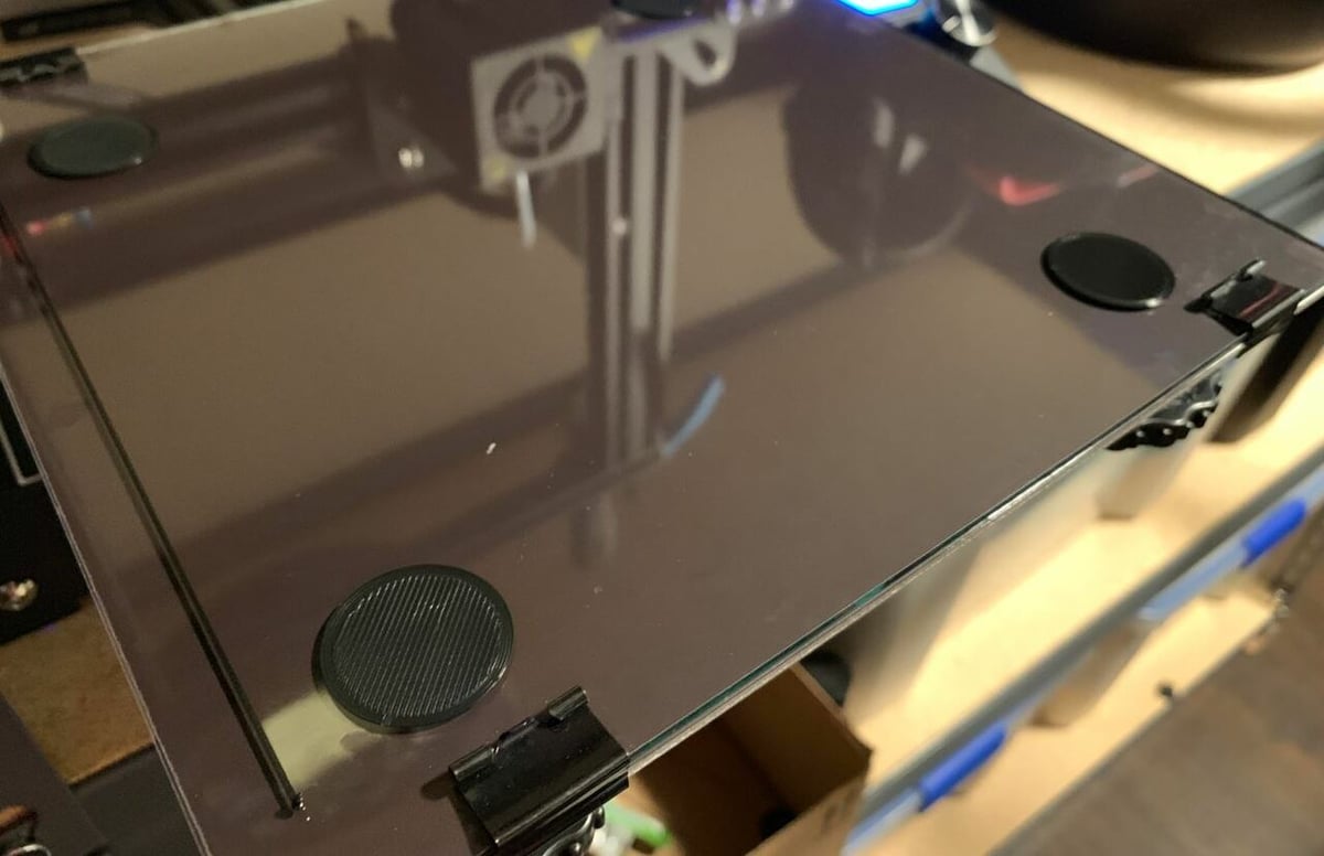 A glass build plate will yield prints with a very smooth bottom layer