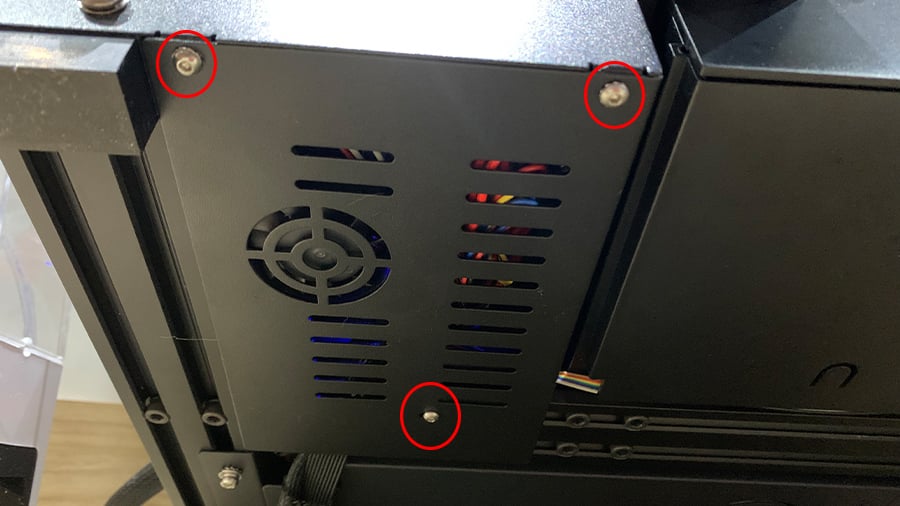 The remaining screws are located under the printer