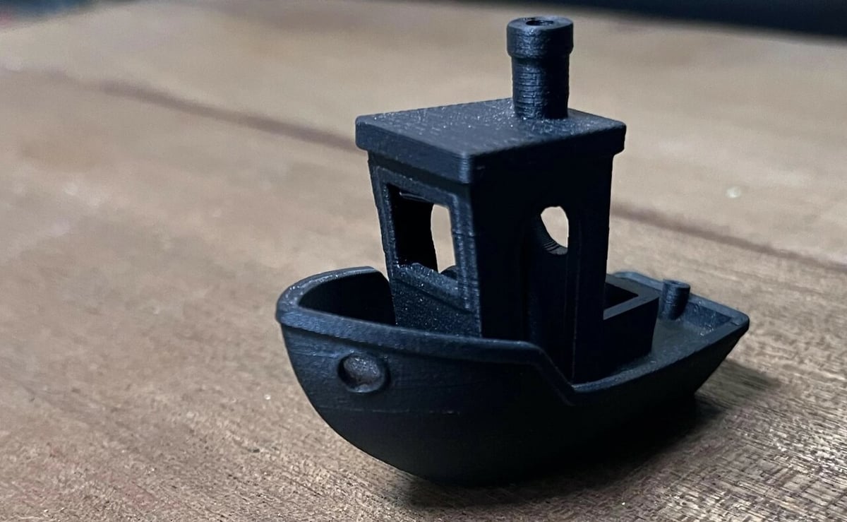 Benchy printed with continuous carbon fiber strand in Onyx
