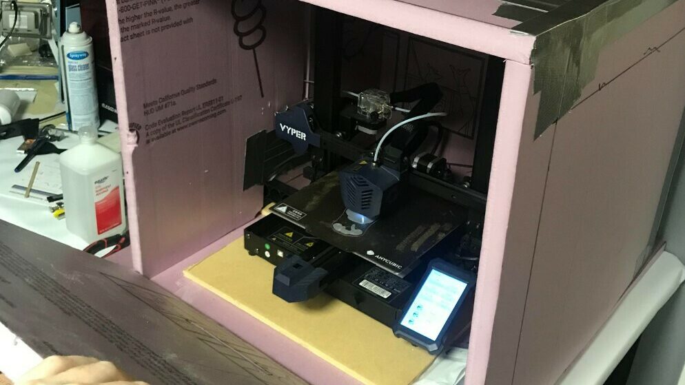 You can DIY an enclosure for your Vyper using materials like wood and acrylic panels