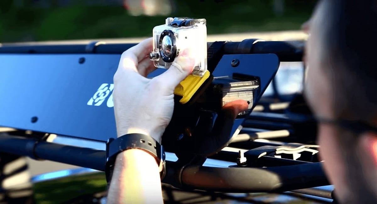 A GoPro and a packing strap is all you need, other than the 3D printed part, of course