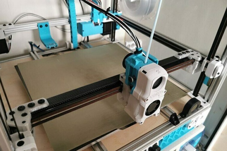 Here's an example of a Voron 2.4 with a gantry made of carbon fiber