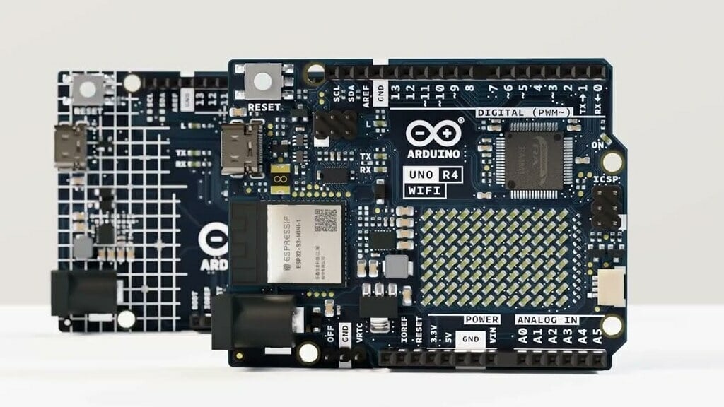 The Arduino Uno R4 series of boards, with the Uno R4 WiFi pictured in front