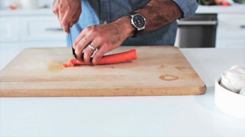 Misen kitchen knife in action (Image: Misen)