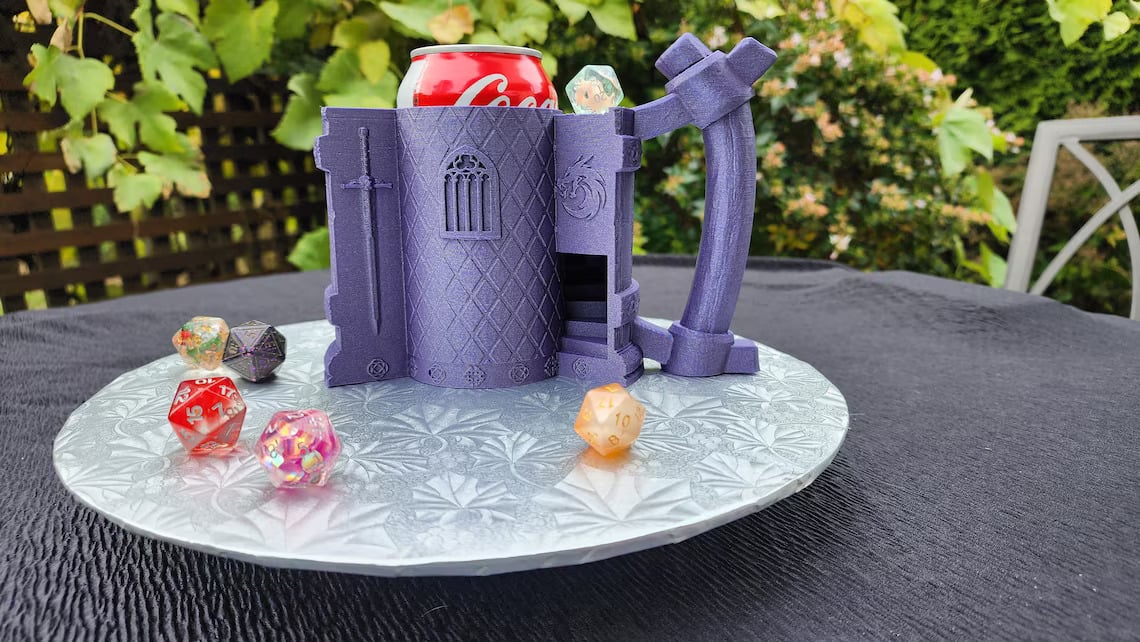 Featured image of This 3D Printable D&D-Themed Can Holder Doubles as a Dice Tower