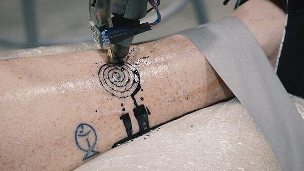 Featured image of World’s First Tattoo by an Industrial Robot Arm