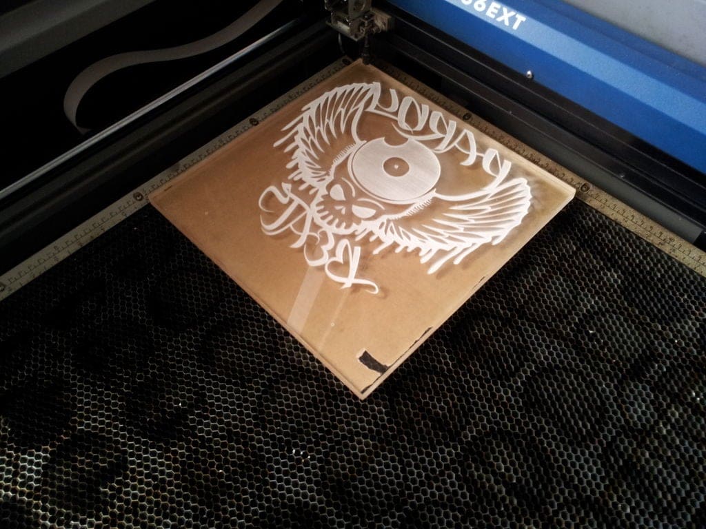 Engraving the sign.