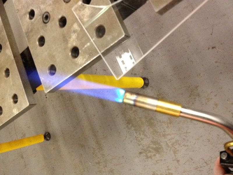 Flame polishing acrylic.