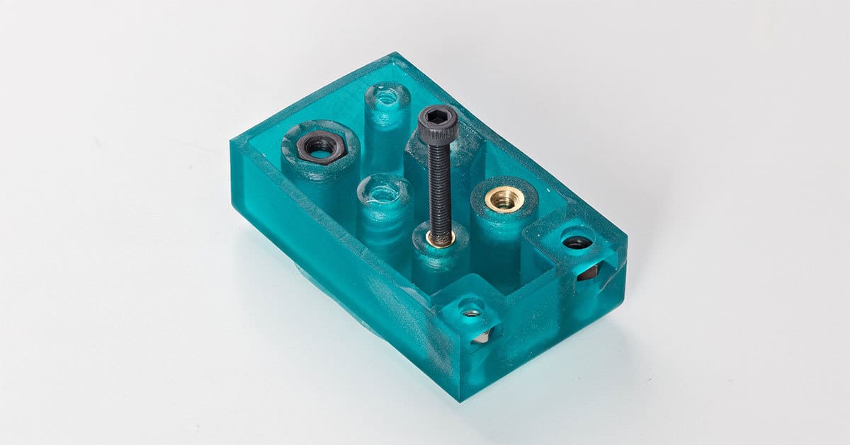 Threaded inserts installed in a print.