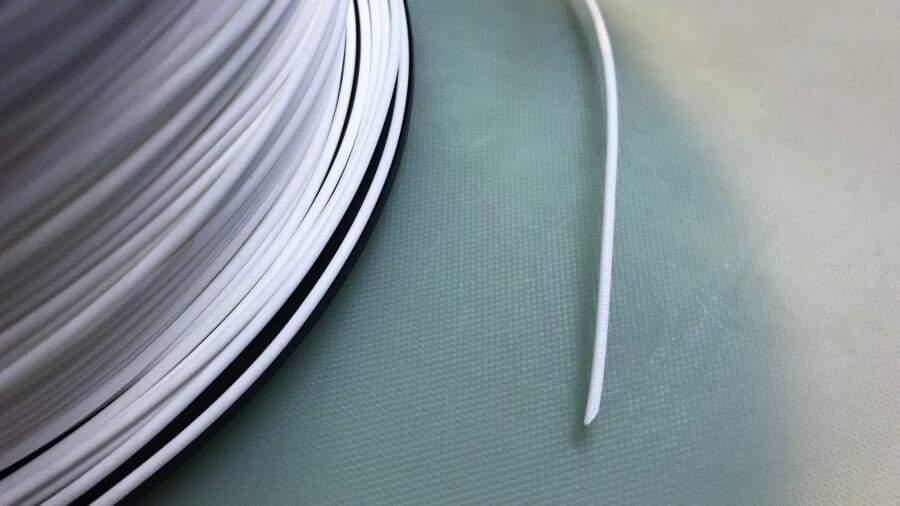 Filament straightened for easy insertion into the extruder and Bowden tube.