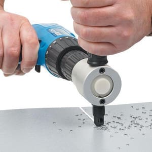 Using a nibbler.