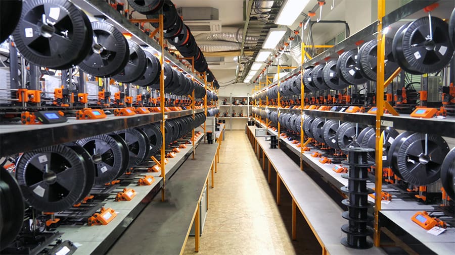 Prusa's famous print farm: 3D printers creating 3D printers