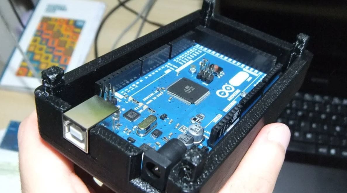 This Arduino board has an onboard 16-MHz crystal oscillator and an LED