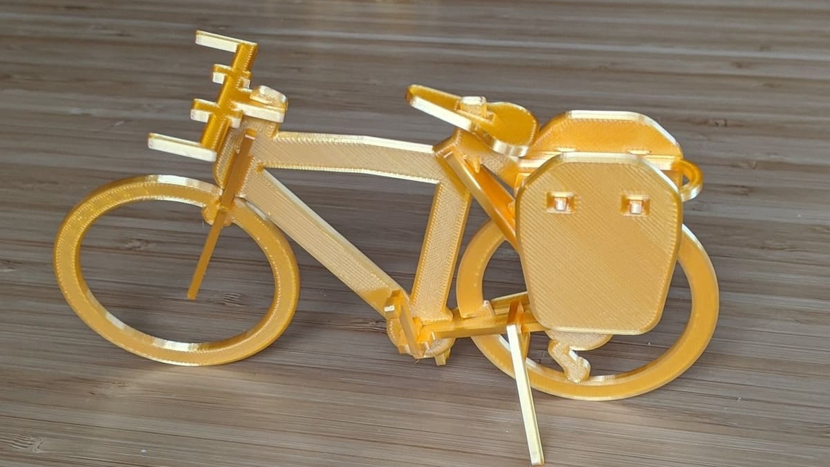 This print looks painted because it was printed with Gold Rush Elixir filament!