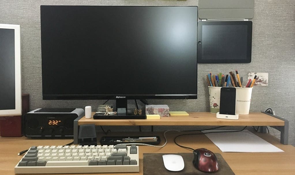 A stylish and useful monitor stand from a spare Hemnes shelf