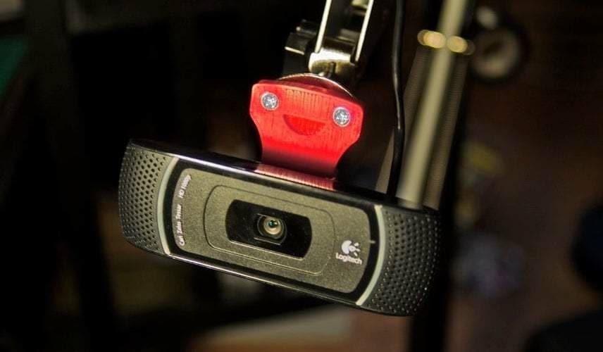 A webcam jib used on a Tertial lamp stand