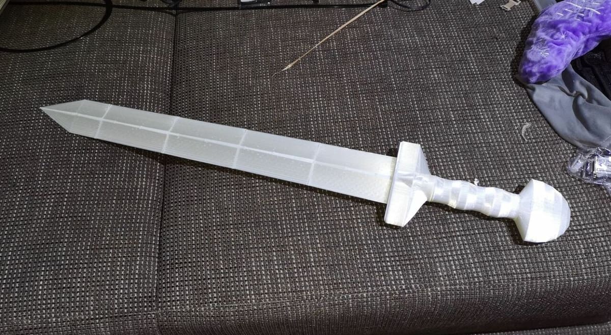 You can print this sword with a 0.3-mm layer height and a 20% infill density