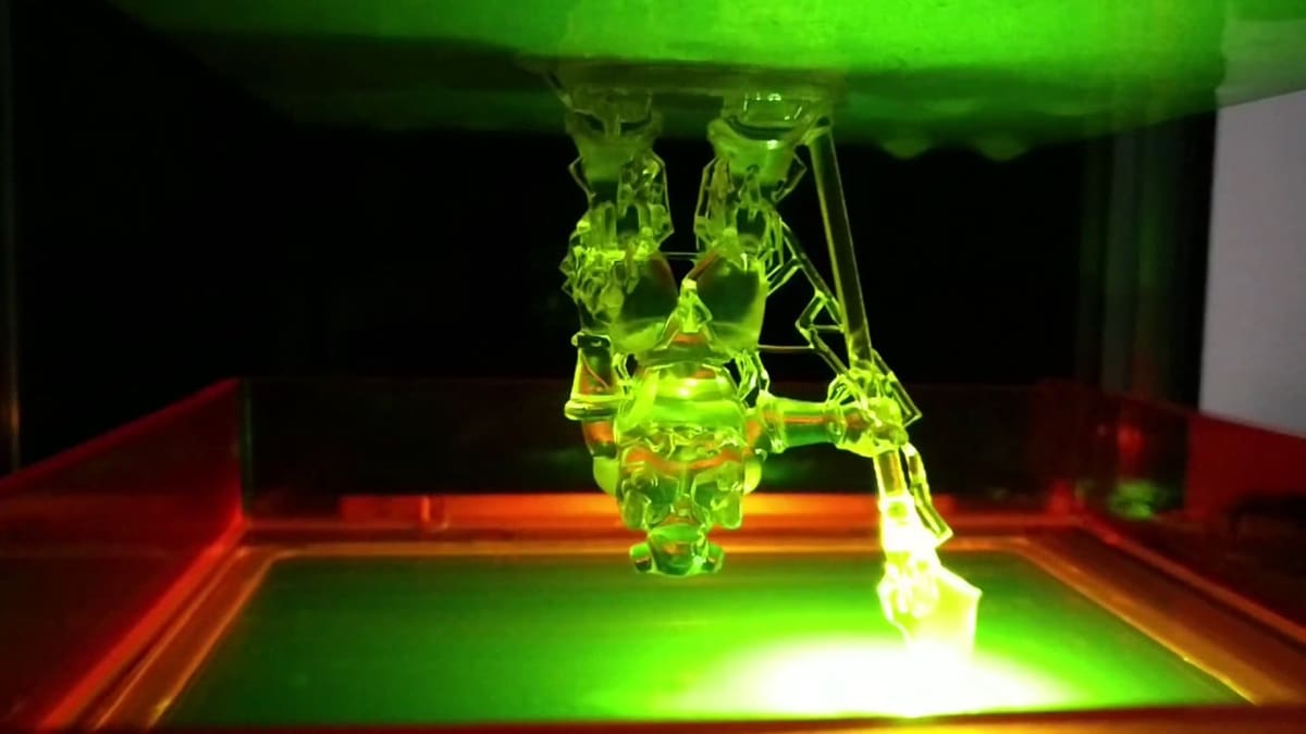 An inverted SLA print, rising from the resin