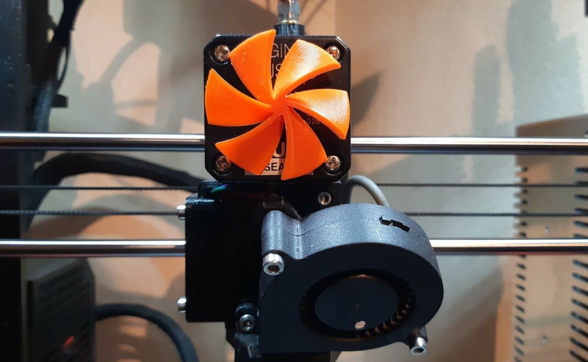 A motor rotation indicator attaches to the motor with a magnet