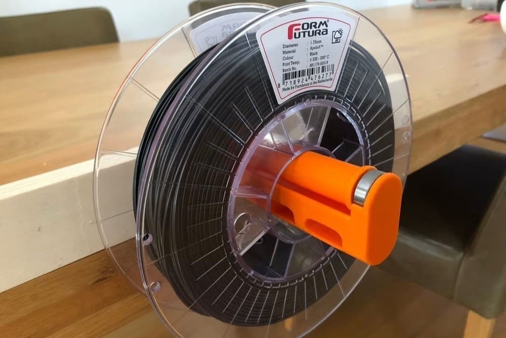 A Filler spool holder mounted to a wooden beam