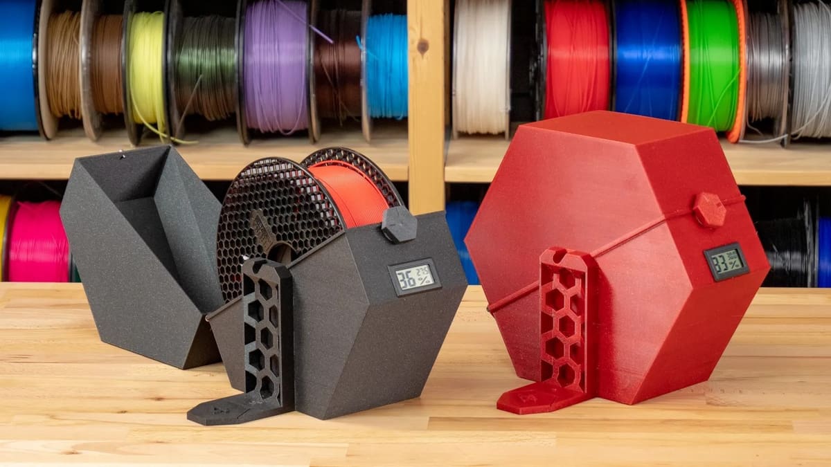 These printable dry box spool holders can display a humidity sensor