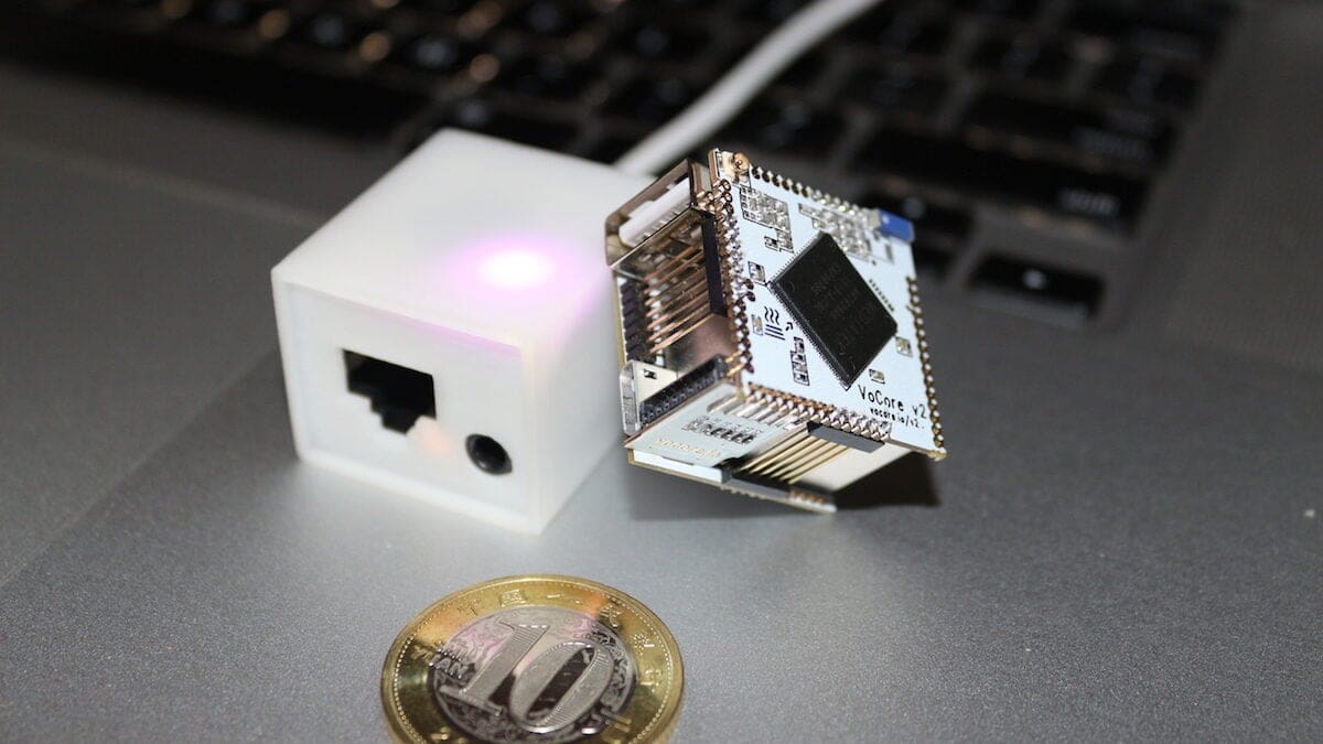 The VoCore 2 chip side to side with a 10 Yuan coin