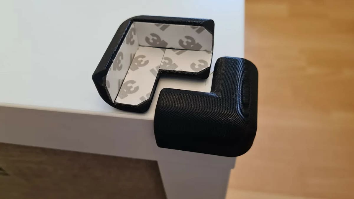 Double-sided tape will secure these corner protectors