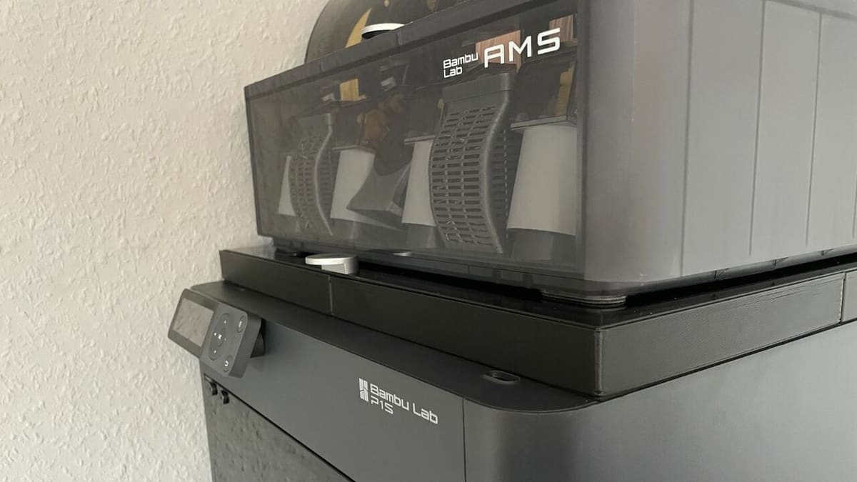 Bambu Lab P1S with AMS on top of it