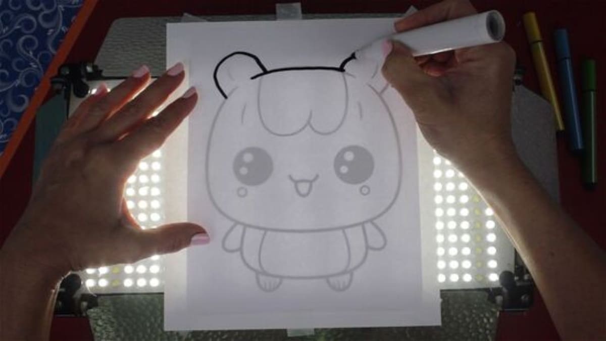 Tracing out a sketch on paper