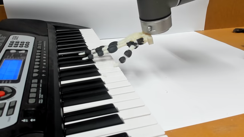 3D Printed Robotic Hand Plays Holiday Tunes on the Piano ...